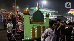 Pawai obor merupakan tradisi yang kerap dilakukan untuk menyambut datangnya bulan suci Ramadan. (Liputan6.com/Angga Yuniar)