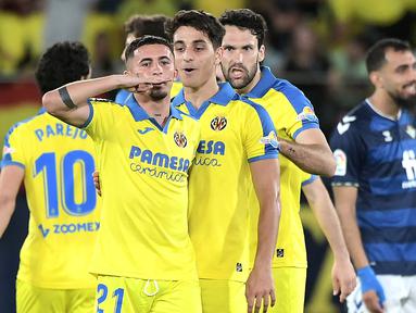 Villarreal bisa dibilang berstatus tim kuda hitam dalam beberapa musim terakhir di La Liga Spanyol. Hal ini tentu tak lepas dari sepak terjang beberapa penggawa Yellow Submarine alias Tim Kapal Selam Kuning yang sering membuat kejutan terhadap lawan-lawannya dengan torehan hattrick. Dalam empat musim terakhir tarcatat ada 5 pemain Villarreal yang sukses mencatatkan hattrick di La Liga. Siapa saja? Ini dia daftarnya. (AFP/Jose Jordan)