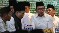 Menteri Ketenagakerjaan, Hanif Dhakiri mengikuti Haul Para Pejuang NU di halaman gedung PBNU, Jakarta, Rabu (10/4/2019). Kegiatan tersebut digelar untuk menghormati jasa-jasa para pejuang NU yang telah meninggal ataupun masih hidup. (Liputan6.com/Johan Tallo)