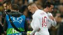 Wayne Rooney memulai pertandingan pada menit ke-58 menggantikan Harry Winks  pada laga persabahatan kontra Amerika Serikat yang berlangsung di Stadion Wembley, Inggris. Timnas Inggris menang 3-0. (AFP/Ian Kington)