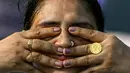 Peringatan ini diusulkan oleh Perdana Menteri India, Narendra Modi, karena ia percaya bahwa yoga bukan hanya aktivitas fisik, tapi juga bagian dari gaya hidup sehat secara mental dan spiritual. (Arun SANKAR/AFP)
