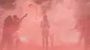 Para peserta berlari saat mengikuti ajang CIMB Niaga Color Run di Senayan, Jakarta Selatan, Minggu (16/9/2018). Sebanyak 13.000 peserta ambil bagian pada ajang lari sejauh lima kilometer. (Bola.com/Vitalis Trisna)