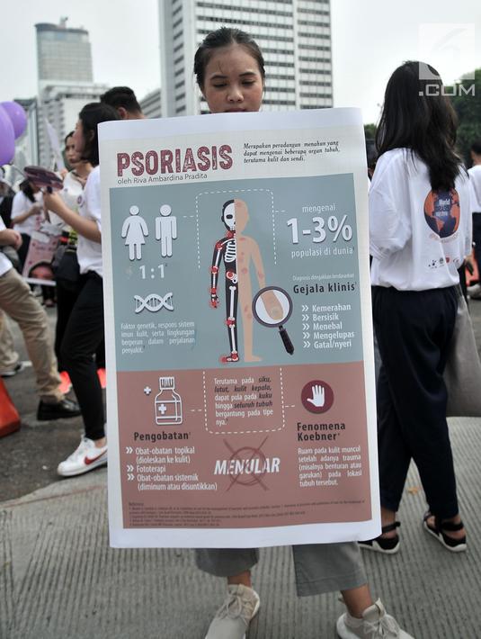 Mahasiswa dari Fakultas Kedokteran Universitas Indonesia (FKUI) menggelar kampanye tentang penyakit Psoriasis saat car free day di Jakarta, Minggu (4/11). Kampanye dilakukan dalam rangka memperingati World Psoriasis Day 2018 (Merdeka.com/Iqbal S. Nugroho)