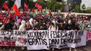 <p>Massa aksi dari berbagai elemen melakukan aksi di Gedung DPR, Jakarta, Kamis (21/4/2022). Aksi yang terdiri dari buruh, mahasiswa dan aktivis menyuarakan untuk menolak penundaan pemilu, kenaikan harga minyak, dan cipta kerja. (Liputan6.com/Angga Yuniar)</p>