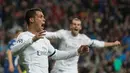 Cristiano Ronaldo mencetak hat-trick untuk membawa Real Madrid menang 3-0 atas VfL Wolfsburg pada leg kedua perempat final Liga Champions di Stadion Santiago Bernabeu, Madrid, Rabu (13/4/2016) dini hari WIB. (AFP/Curto De La Torre)