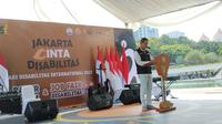 Pj Gubernur DKI Heru Budi Hartono menghadiri acara Jakarta Cinta Disabilitas dalam rangka memperingati Hari Disabilitas Internasionali di Taman Lapangan Banteng, Jakarta Pusat, Sabtu (3/12/2022). (Liputan6.com/Winda Nelfira)