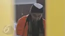 Terdakwa kasus terorisme Afif Abdul Majid saat sidang tuntutan di PN Jakarta Pusat, Senin (8/6). Afif dituntut 8 tahun penjara karena diduga melakukan tindak pidana terorisme dengan mendeklarasikan dukungan kepada ISIS. (Liputan6.com/Herman Zakharia)