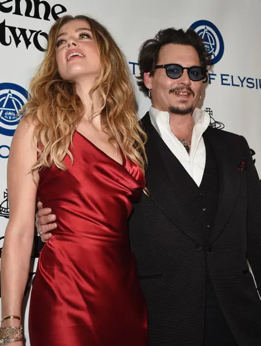 Depp pun juga menyetujui niat baik mantan istrinya tersebut. Meskipun tersiar kabar sempat diperbincangkan lantaran Depp yang tak kunjung menunaikan janjinya tersebut. (AFP/Bintang.com)
