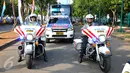 Bus pemudik dikawal patwal polisi dari Polda Metro Jaya saat acara pelepasan mudik gratis di kawasan Parkir Timur Senayan, Jakarta, Sabtu (11/7/2015). Mudik gratis Jasa Raharja tahun 2015 ini meraih rekor MURI. (Liputan6.com/Yoppy Renato)