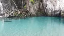 Suasana Sungai Tamborasi di Desa Tamborasi, Kecamatan Wolo, Kabupaten Kolaka, Sulawesi Tenggara (16/10/2019). Panjang Sungai Tamborasi hanya 20 meter, dengan lebar 15 meter. Hulu sungai sangat berdekatan dengan hilir yang bermuara ke Pantai Tamborasi. (Liputan6.com/Nurseffi Dwi Wahyuni)