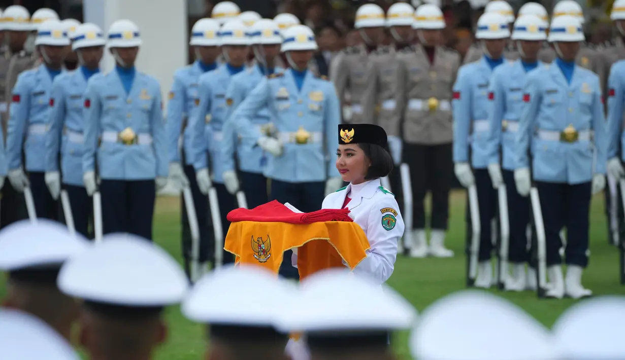 Upacara dimulai pada pukul 11.00 WITA. (AP Photo/Achmad Ibrahim)