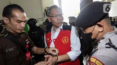 Terdakwa kasus obstruction of justice atau upaya untuk menghalang-halangi suatu proses hukum pada kasus pembunuhan Brigadir Nofriansyah Yosua Hutabarat atau Brigadir J, Agus Nurpatria bersiap untuk menjalani sidang lanjutan dengan agenda pembacaan tuntutan oleh Jaksa Penuntut Umum di Pengadilan Negeri Jakarta Selatan, Jumat (27/1/2023). Mantan Kepala Detasemen (Kaden) A Biro Paminal Polri tersebut dituntut 3 tahun penjara dan denda sebesar Rp 20 juta subsider 3 bulan kurungan. (Liputan6.com/Johan Tallo)