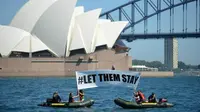 Aksi menentang penahanan pencari suaka di Australia pada 2016 (AFP)