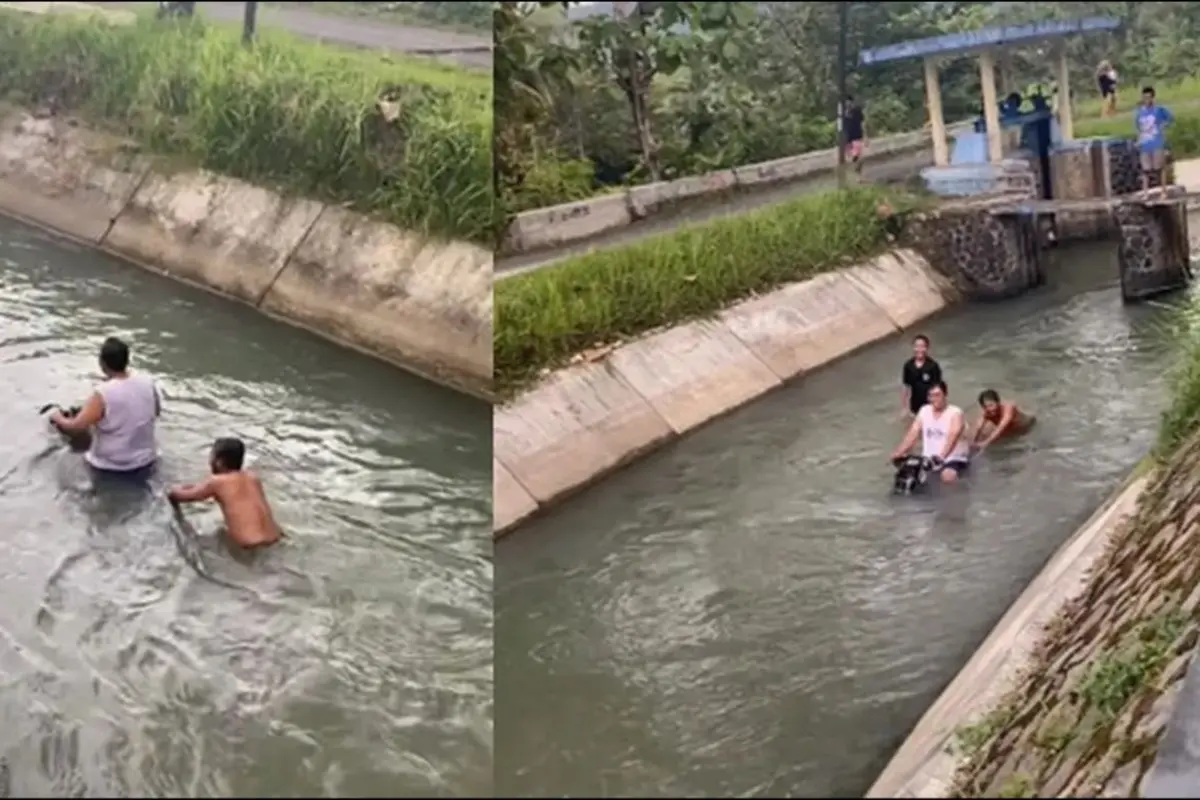 Terlanjur Basah, Tiga Pria Ini Akhirnya Pilih Naik Motor Menyusuri Sungai