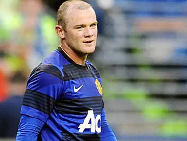 Ekspresi striker Manchester United Wayne Rooney seusai mencetak gol ke gawang Seattle Sounders pada laga pramusim di Seattle, AS, 20 Juli 2011. Steve Dykes/Getty Images/AFP