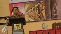 Menteri Yohana Yambise memberikan pidato saat Pertemuan Nasional Gugus Tugas Penanganan Korban Tindak Pidanan Perdangangan Orang dan Tindak Kekerasa Terhadap Perempuan dan Anak di Jakarta, Jumat (27/11). (Liputan6.com/Faizal Fanani)