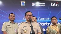 Gubernur Jakarta Pramono Anung hadiri penandatanganan Nota Kesepahaman (MoU) dengan BTN untuk benahi fasilitas Ancol dan JIS. (Liputan6.com/Winda Nelfira)