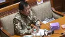 Mantan Menteri Kesehatan Terawan Agus Putranto memberikan paparan dalam rapat dengan Komisi IX DPR RI di Senayan, Jakarta, Rabu (10/3/2021). Dalam rapat tersebut, Ketua Tim Pengembangan Vaksin Nusantara Terawan Agus Putranto buka-bukaan soal pengembangan Vaksin Nusantara. (Liputan6.com/Angga Yuniar)