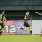 Pemain Timnas Malaysia U-19, Muhammad Faiz, melakukan selebrasi usai mencetak gol ke gawang Timnas Laos U-19 pada laga final Piala AFF U-19 2022 di Stadion Patriot Chandrabhaga, Bekasi, Jumat (15/7/2022). (Bola.com/Bagaskara Lazuardi)