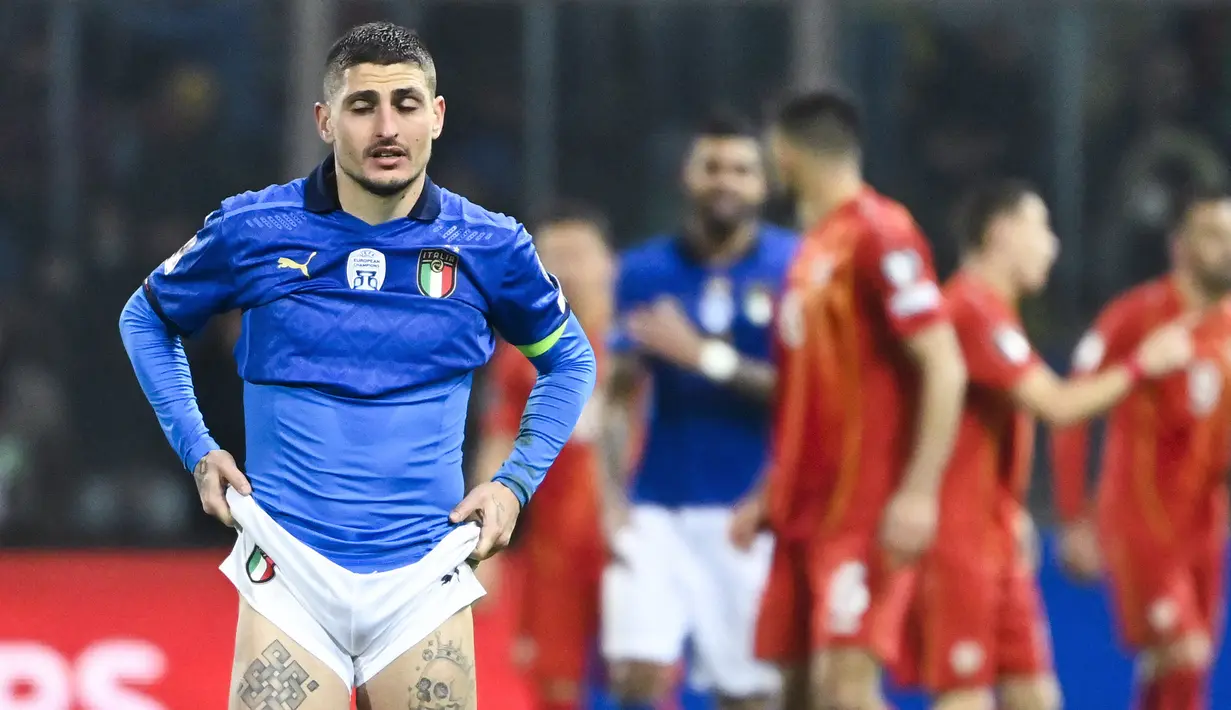 Catatan 18 penampilan Italia terhenti di dua edisi ajang Piala Dunia yaitu tahun 2018 dan 2022. Juara Euro 2020 tersebut gagal melangkah ke putaran final usai disingkirkan Makadonia Utara pada laga semifinal playoff kualifikasi Piala Dunia 2022, 25 Maret 2022 WIB. (AFP/Alberto Pizzoli)