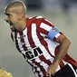 Kapten Estudiantes, Juan Sebastian Veron (kanan) merayakan golnya ketika berhadapan dengan klub Brasil, Cruzeiro di partai Grup 5 Copa Libertadores 2009 di Stadion Unico, La Plata, Buenos Aires, 8 April 2009. AFP PHOTO/ALEJANDRO PAGNI