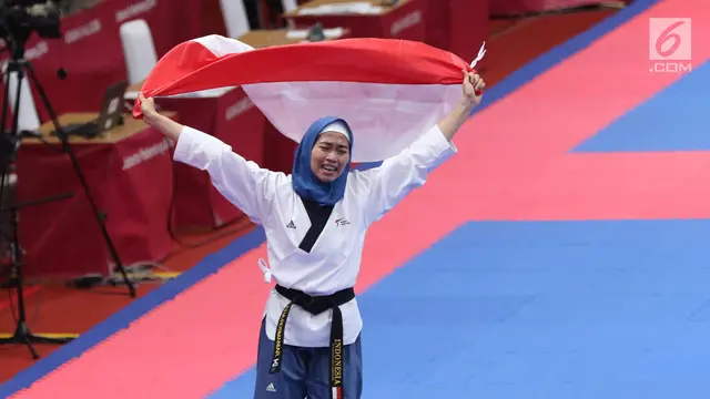 Ekspresi Defia Rosmaniar Saat Raih Emas