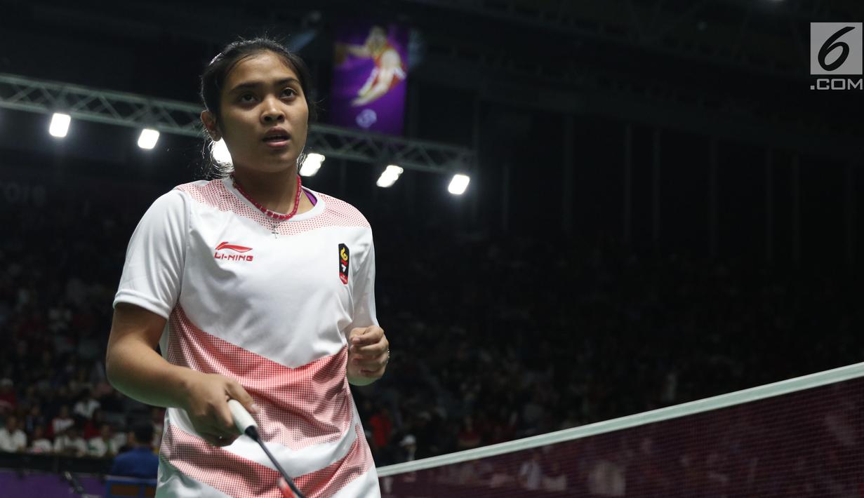 Tunggal putri Indonesia, Gregoria Mariska Tunjung saat melawan pemain India, Pusarla V Sindhu di babak 16 besar Bulutangkis Tunggal Putri Asian Games 2018 di Istora Kompleks GBK, Jakarta, Sabtu (25/8). (Liputan6.com/Helmi Fithriansyah)