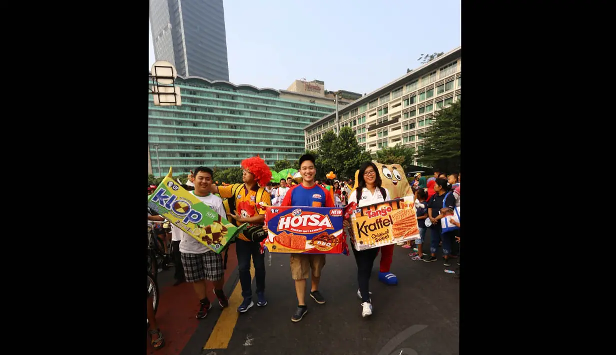 Acara parade ini adalah bentuk pengingat komitmen perusahaan-perusahaan tersebut untuk memberikan pelayanan terbaiknya kepada pelanggan, Jakarta,  Minggu (7/9/14). (Liputan6.com/Johan Tallo)