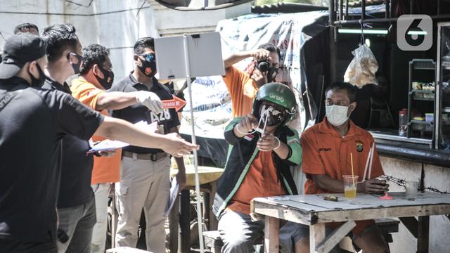 FOTO: Rekonstruksi Pembunuhan Bos Pelayaran di Kelapa Gading