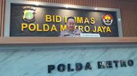 Kabid Humas Polda Metro Jaya, Kombes Trunoyudo di Polda Metro Jaya. Dia mengungkap gelombang arus mudik dan balik diperkirakan terjadi dua kali pada Lebaran 2023. (Liputan6.com/Ady Anugrahadi)