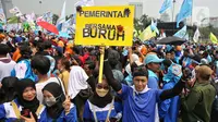 Ketika itu, para pekerja menuntut adanya pengurangan jam kerja menjadi delapan jam sehari tanpa pengurangan upah. (Liputan6.com/Angga Yuniar)
