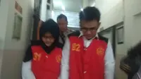 Pembunuh dan pembakar suami dan anak tiri, Aulia Kesuma dan Geovani Kelvin menjalani sidang di PN Jakarta Selatan, Senin (10/2/2020). (Merdeka.com)