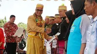Menteri Sosial (Mensos) Agus Gumiwang Kartasasmita membuka acara Harmoni Kebangsaan 2018 di Tanah Luwu, Kabupaten Luwu Utara, Sulawesi Selatan, Selasa, 30 Oktober.