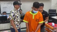 Anak anggota DPRD Riau yang ditahan oleh Polresta Pekanbaru karena melakukan penganiayaan dan pengeroyokan terhadap warga. (Liputan6.com/M Syukur)