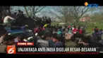 Protes solidaritas terhadap para pemberontak yang terlibat pertempuran sengit dengan pasukan India hingga menyebabkan setidaknya 13 pemberontak dan 3 personil militer tewas.
