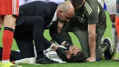 Kemenangan Real Madrid atas Benfica dalam laga leg 2 play off Liga Champions 2025/2026, Selasa (25/02/2026) waktu setempat harus dibayar mahal dengan cedera Raul Asencio. (AFP/Pierre-Philippe Marcou)