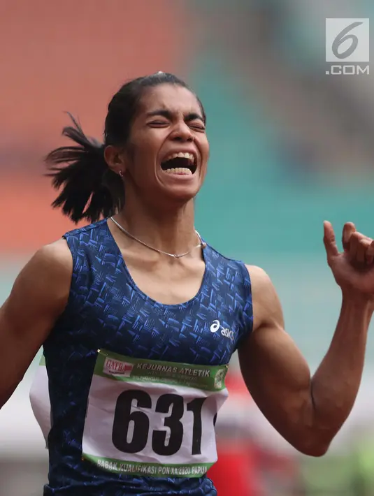 Atlet asal Maluku, Alvin Tehupeiory saat menyelesaikan lomba lari 200 meter putri senior Kejurnas Atletik U18, U20 dan Senior 2019 di Stadion Pakansari, Bogor, Minggu (4/8/2019). Alvin Tehupeiory meraih posisi pertama dengan catatan waktu 23,76 detik. (Liputan6.com/Helmi Fithriansyah)