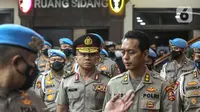 Mantan Kadiv Propam Irjen Ferdy Sambo  usai menjalani sidang kode etik di Gedung TNCC Mabes Polri, Jakarta, Jumat (26/8/2022). Irjen Ferdy Sambo resmi dipecat secara tidak hormat dari Polri. Keputusan dikeluarkan oleh Komisi Etik Profesi Polri (KEPP) pada Jumat (26/8/2022) dinihari WIB. (Liputan6.com/Faizal Fanani)