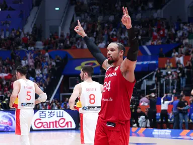 Pebasket Kanada, Dillon Brooks merayakan kemenangan atas Spanyol pada laga Grup L Piala Dunia FIBA 2023 di Indonesia Arena, Senayan, Jakarta, Minggu (03/09/2023). Kanada lolos ke babak perempat final setelah menang dengan skor 88-85. (Bola.com/Bagasakara Lazuardi)