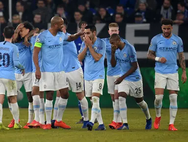 Selebrasi gol kedua Man City yang dicetak Raheem Sterling pada leg 1, 16 besar Liga Champions 2018/19 yang berlangsung di stadion Veltins-Arena, Gelsenkirchen, Kamis (21/2). Man City menang 3-2 atas Schalke. (AFP/Odd Andersen)