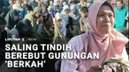 Bukan ratusan, tapi ribuan warga saling tindih berebut gunungan hasil bumi. Dalam hitungan menit, lebih dari 80 tumpeng dan gunungan ludes diperebutkan.