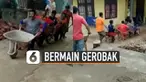Aksi bapak-bapak bermain gerobak ini mengingatkan seperti waktu dulu menjadi bocah.