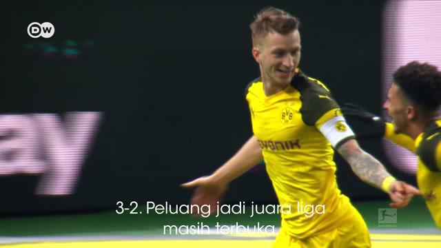 Berita video DW Matchday Moments menghadirkan Marco Reus yang berhasil mencetak gol ke gawang Hertha Berlin. Torehannya tersebut membuat Borussia Dortmund masih bersaing dengan Bayern Munchen untuk gelar juara Bundesliga 2018-2019.