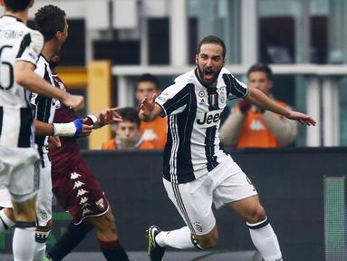 Juventus meraih kemenangan 3-1 atas Torino dalam laga pekan ke-16 Serie A 2016-2017 di Stadion Olimpico Grande Torino, Minggu (11/12/2016). (AFP/Marco Bertorello)