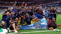 Para pemain Tanjung Verde merayakan hasil imbang 0-0 dalam pertandingan Grup H Piala Dunia 2026 antara Cabo Verde dan Arab Saudi di Stadion Houston pada 27 Juni 2026 di Houston, Texas. (Michael Steele/Getty Images via AFP)