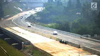 Kondisi arus lalu lintas di jalan fungsional Bocimi di kawasan Cigombong, Bogor (9/6). Ruas Tol Bocimi Seksi I akan terus dibuka secara fungsional tanpa tarif alias gratis hingga H+7 Lebaran. (Merdeka.com/Arie Basuki)