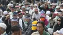 Sejumlah peserta massa aksi Gerakan Nasional Kedaulatan Rakyat saat melakukan unjuk rasa di depan Gedung Bawaslu, Jakarta, Selasa (21/5). Mereka menolak hasil Pemilu 2019 yang dinilai banyak terdapat kecurangan. (Liputan6.com/Helmi Fithriansyah)