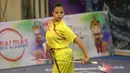 Atlet Wushu asal Mesir, Hager Mohamed Farahat saat beraksi, pada Kejuaraan Dunia Wushu 2015 di Istora Senayan, Jakarta, Minggu(15/11/2015). (Bola.com/Nicklas Hanoatubun)