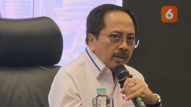 Direktur & Chief Regulatory Officer XLSmart Telecom Sejahtera, Merza Fachys, dalam RUPST Tahun Buku 2025, Rabu (20/5/2026) di Jakarta. Liputan6.com/Iskandar