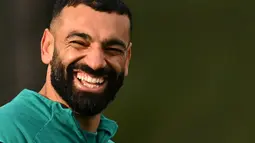 Mohamed Salah juga mengunggah video perpisahan dengan Liverpool di akun sosial media pribadinya pada Selasa (24/03/2026) waktu setempat. (AFP/Oli Scarff)
